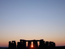 Winter solstice sunset from the walkway inside the monument field at Stonehenge.